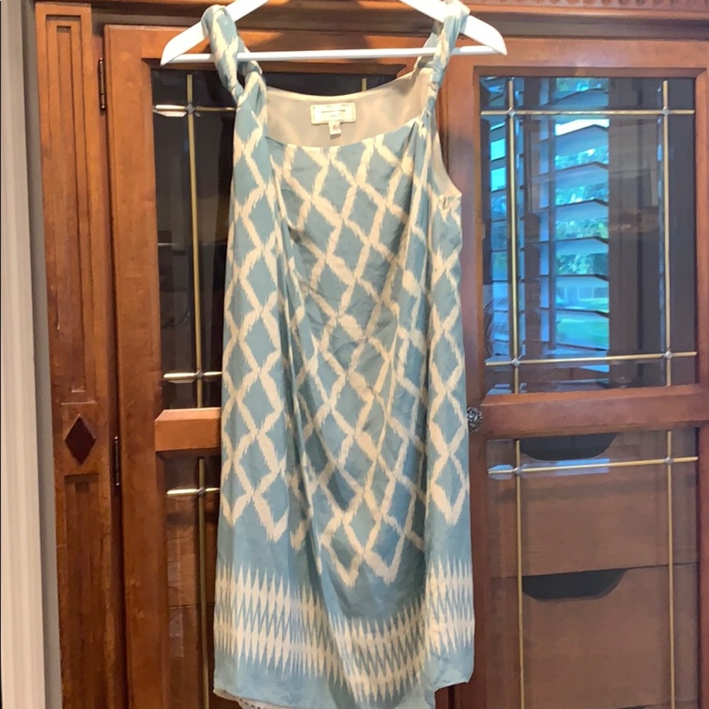 Great light and fun strapped dress.